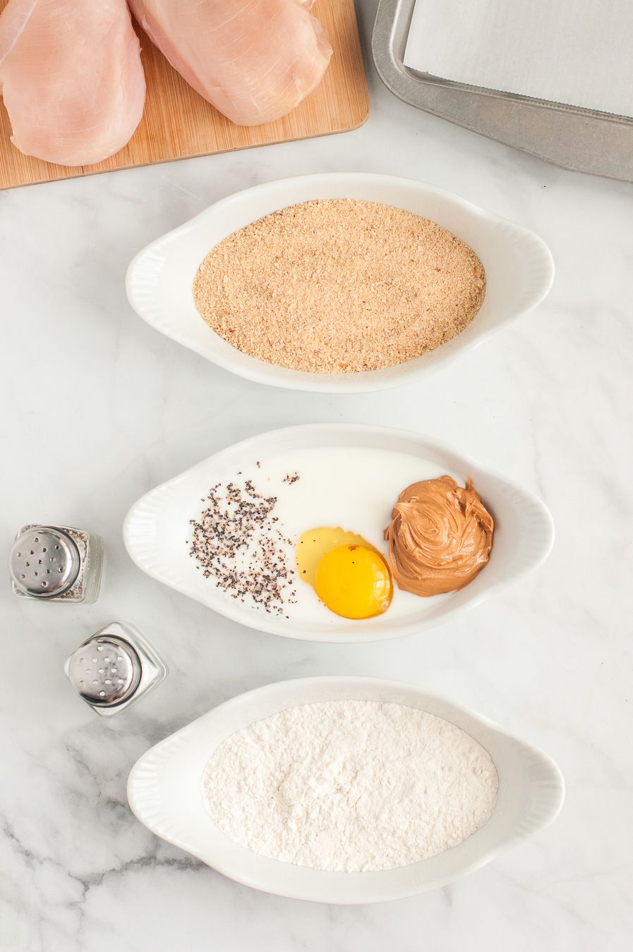 3 bowls for mixing, breadcrumbs and milk mixture.