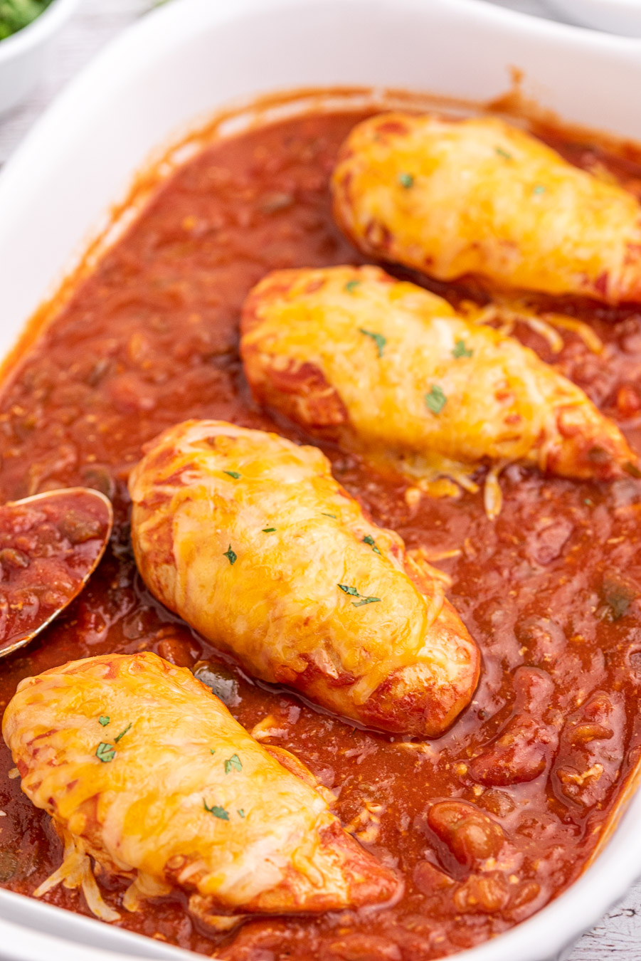 saucy mexican chicken breasts in serving dish