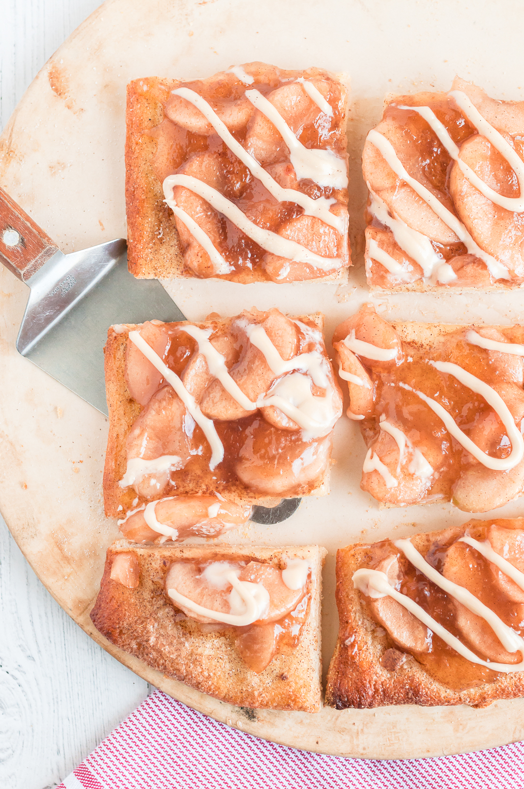 serving dessert pizza with a spatula