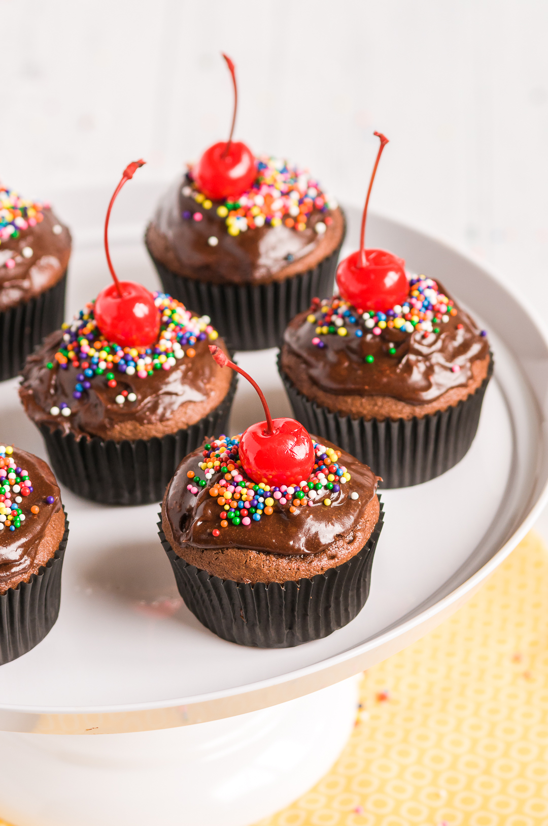 platter of chocolate cupcakes