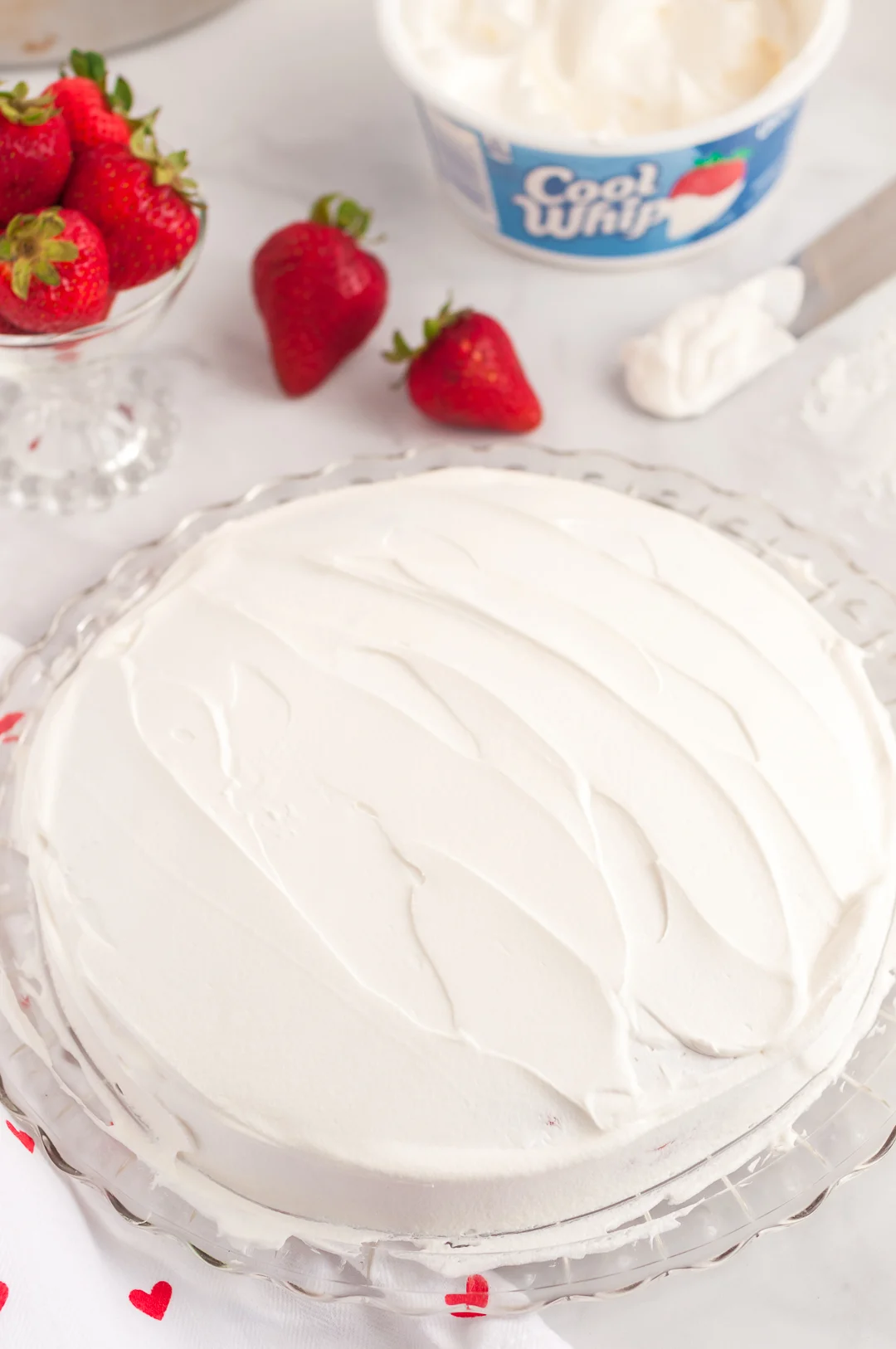 Cool Whip spread onto cake