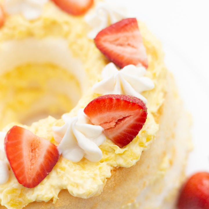 Pineapple Layered Cake Topped with Strawberries.