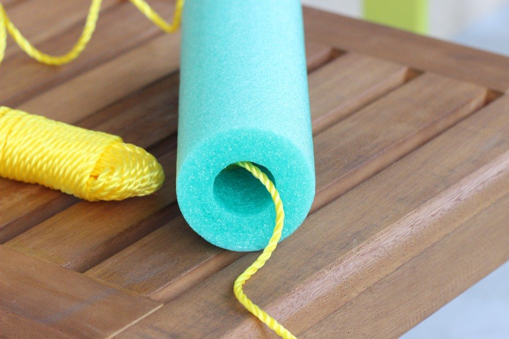 Brilliant! Make a floating pool noodle toy bin this summer! Cheap and easy!