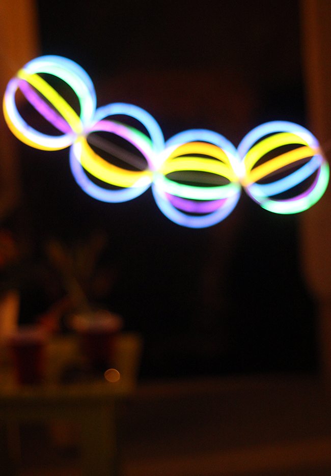 Totally cheap way to decorate for summer parties. Just use those $1 store Glow in the dark balls!