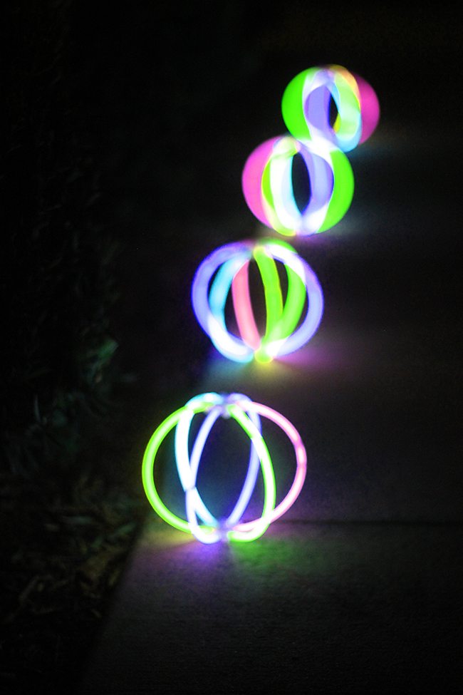 Totally cheap way to decorate for summer parties. Just use those $1 store Glow in the dark balls!