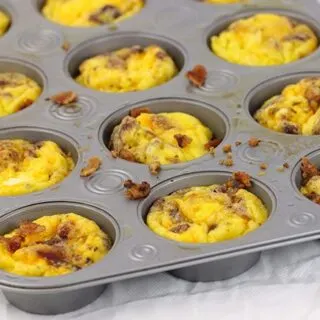 Breakfast quick fix favorite! Cheddar and Bacon made into adorable easy to make omelet cups. Nom.