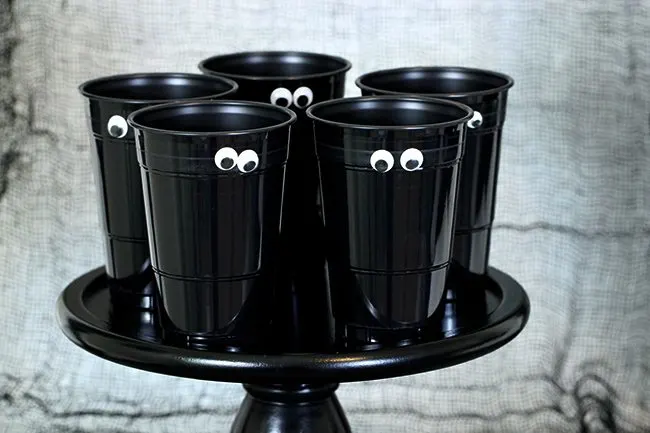 So spooky, so easy! Just slap on some sticky googly eyes for an easy Halloween party cup.