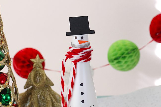 Turn a shampoo bottle into a snowman gift. Super simple DIY.