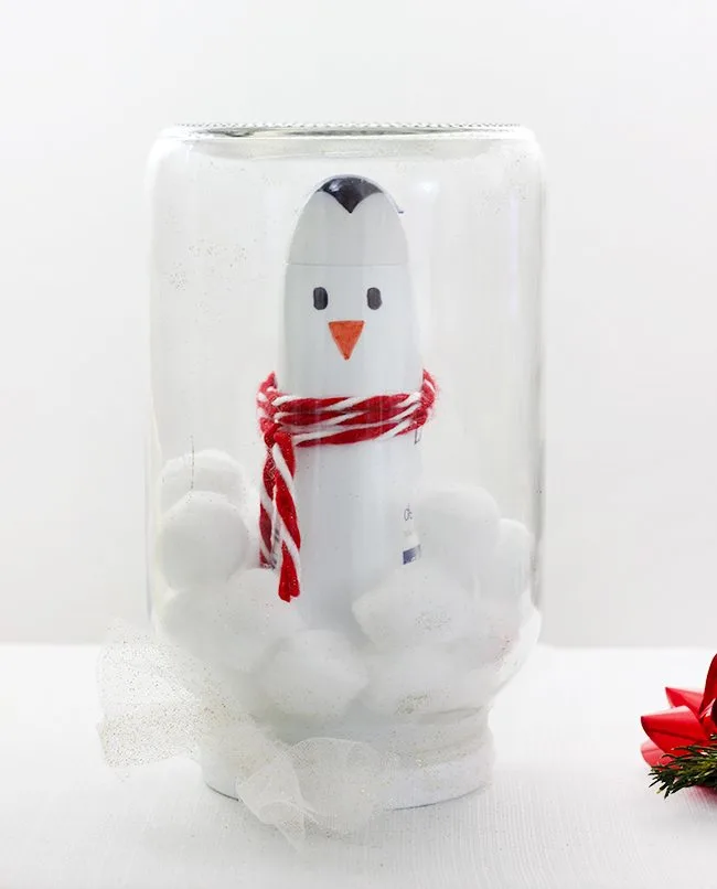 Awww this is so stinkin' cute. Looks like this can be made in just minutes. Loving this for a few girls on my shopping list.. that penguin is made with a Dove body wash bottle. 
