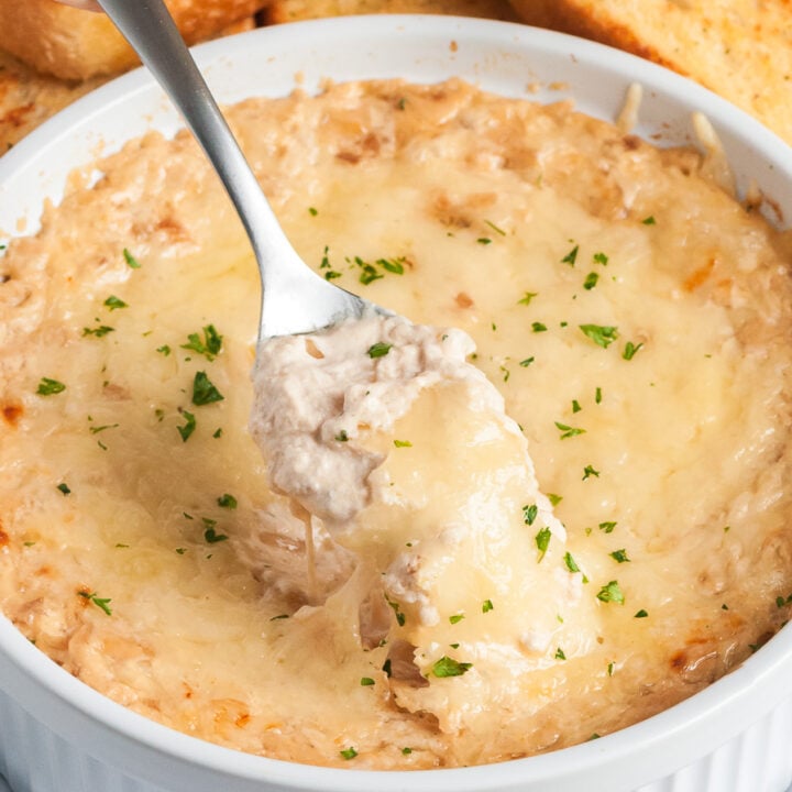 spooning dip out of serving bowl