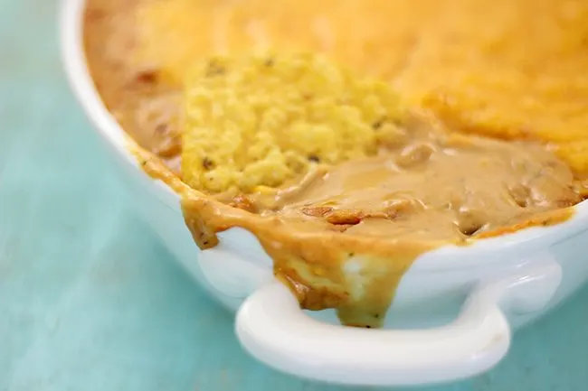 Oozy cheesy bean dip recipe. So easy, you won't believe you haven't tried it yet.