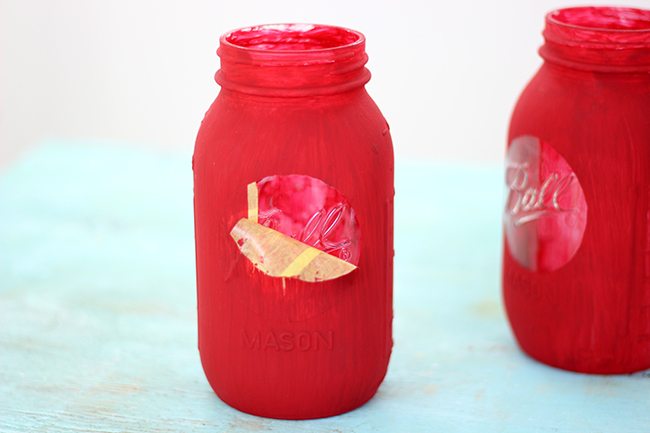 Dr. Seuss fan? Add a pop of fun to a room or party with these DIY Thing 1 and Thing 2 Mason Jars. So adorbs!
