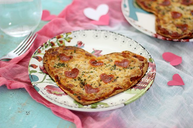 Make your sweetie smile with this super easy heart shaped pizza flatbread with the cutest heart shaped pepperoni. 