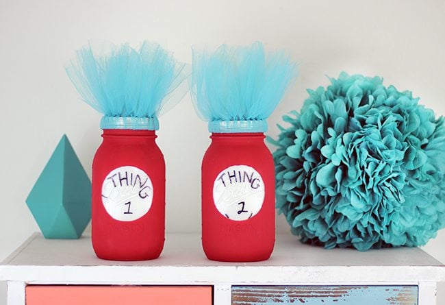 Dr. Seuss fan? Add a pop of fun to a room or party with these DIY Thing 1 and Thing 2 Mason Jars. So adorbs!