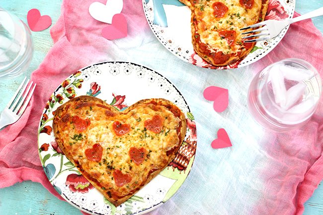 Make your sweetie smile with this super easy heart shaped pizza flatbread with the cutest heart shaped pepperoni. 