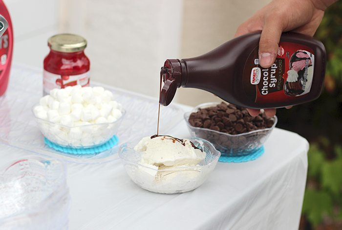 Cutest sweet ice cream party set up ideas. Get simple Dollar Store Budget Friendly Ideas to Make Your Party Pop. DIY Party. The tissue paper back drop is genius. 