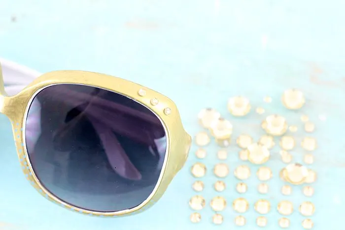 DIY Sunglasses. Embrace your own style this summer with these diy sunglasses. Use paint markers and gems to take this summer to the next level. Super easy tutorial.