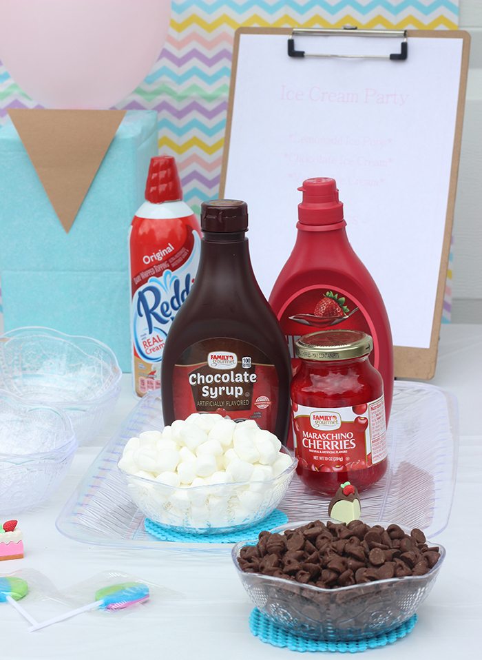 Cutest sweet ice cream party set up ideas. Get simple Dollar Store Budget Friendly Ideas to Make Your Party Pop. DIY Party. The tissue paper back drop is genius. 