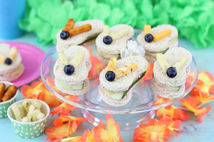 Flip Flop Sandwiches. So cute, great for summertime parties and beach parties. These are made with Sargento Cheese Snacks, Blueberries, Cucumbers and Strawberry Cream Cheese. Adorable! 