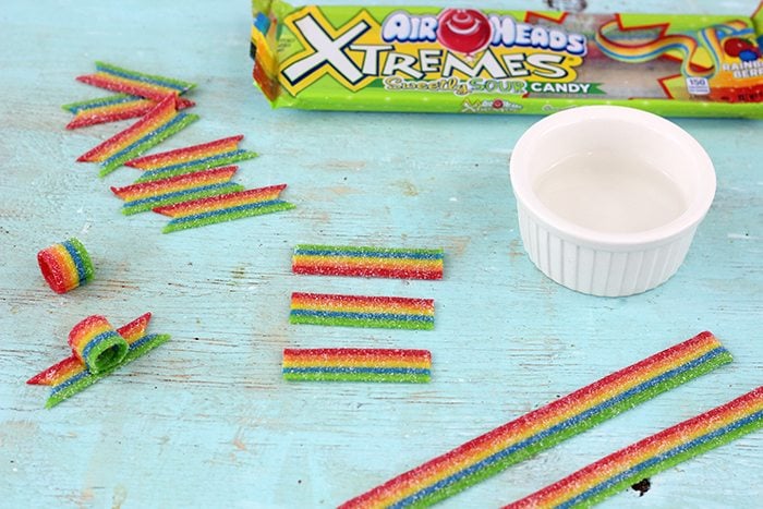 Rainbow Cupcakes. Make super cute and easy rainbow cupcakes with Air Heads Xtremes.