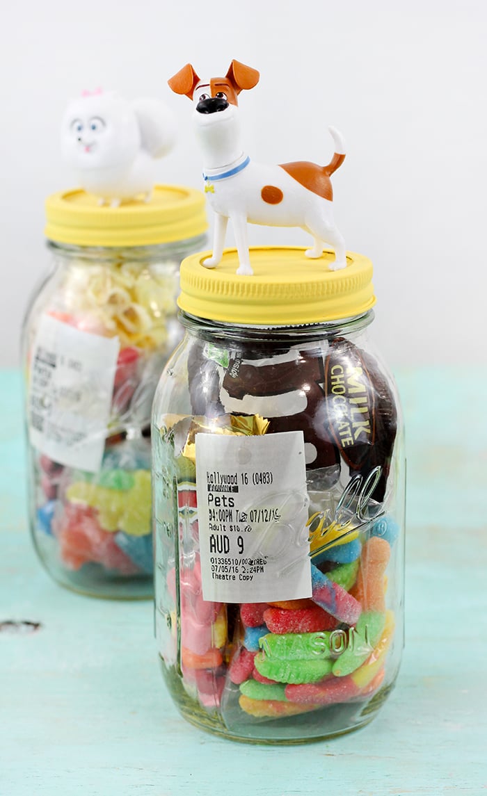 DIY Movie Invite In a Jar. Make movies even more special by inviting your guest with a jar filled with movie goodies and their ticket. 