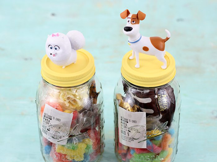 DIY Movie Invite In a Jar. Make movies even more special by inviting your guest with a jar filled with movie goodies and their ticket. 