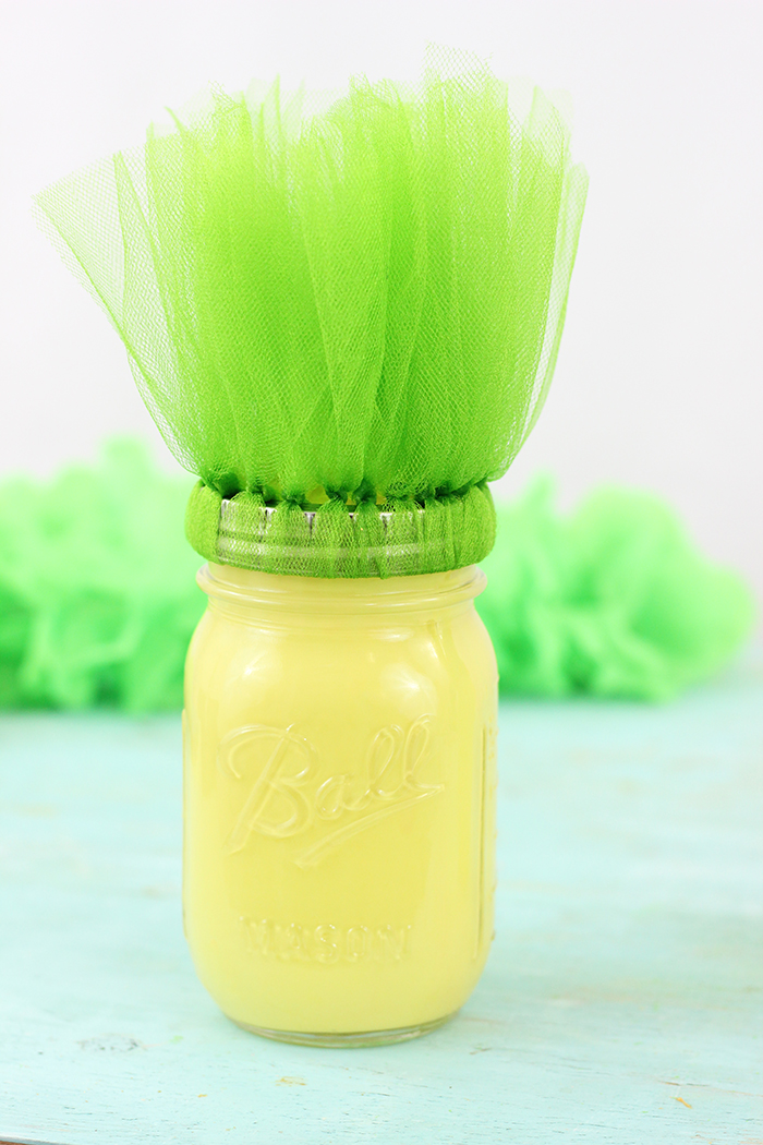 DIY Pineapple Mason Jars are so easy to make with paint and another surprising household product!