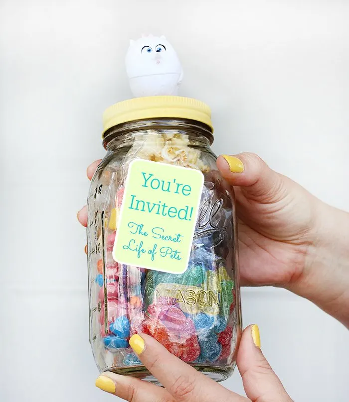 DIY Movie Invite In a Jar. Make movies even more special by inviting your guest with a jar filled with movie goodies and their ticket. 