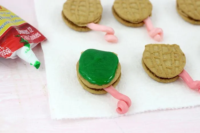 Chameleon cookies, perfect for themed parties and to get excited about The Wild Life movie. Easy to make with only a handful of easy to find ingredients.