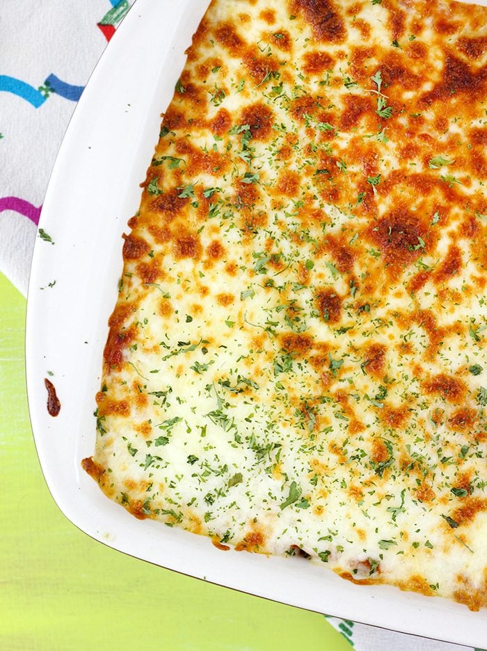 Cheesy Spaghetti Bake recipe comes together so quick and is SO cheesy and creamy. No joke. Perfect back to school recipe to add to your recipe box for sure.