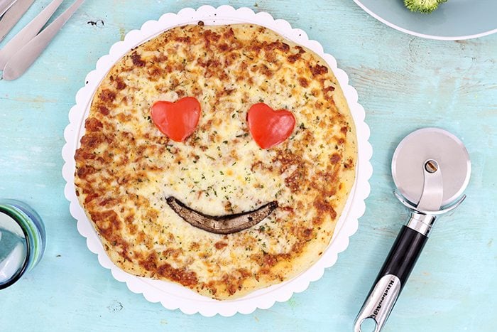 Smiley Face Veggie Pizza. Get your family smiling with these cute veggie emoticon pizza faces. From peppers. mushrooms, olives and broccoli you can get fun in the kitchen.