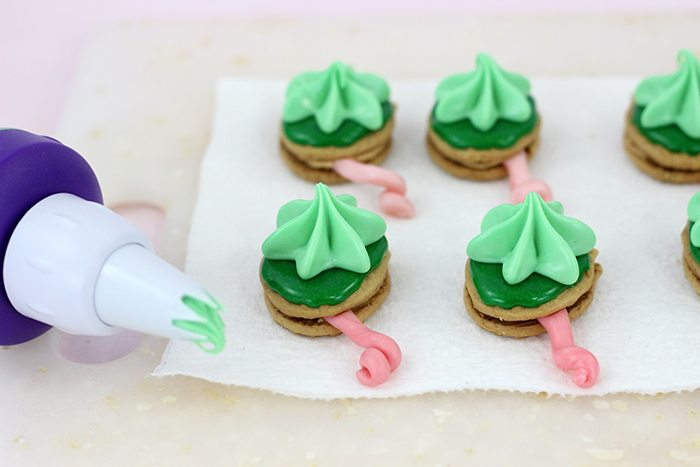 Chameleon cookies, perfect for themed parties and to get excited about The Wild Life movie. Easy to make with only a handful of easy to find ingredients.