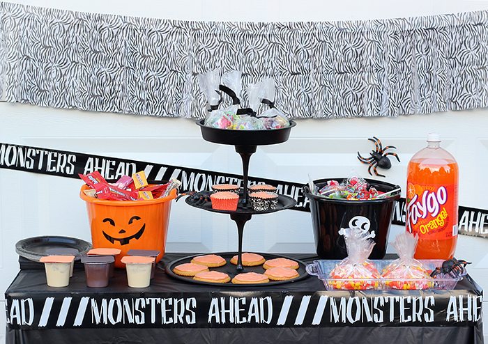 Halloween Party Table that's Sweet and Spooky. Put together an entire party on a tiny budget with easy shortcuts and DIY ideas.