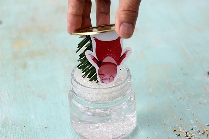 Snow Globes inspired by the SING movie. DIY project that you can do with kids.
