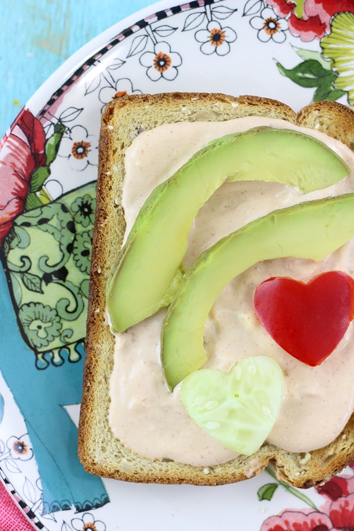 Veggie Valentine's Day Twist. Veggie Toasts with Cute Heart Shaped Veggies Served on Top.