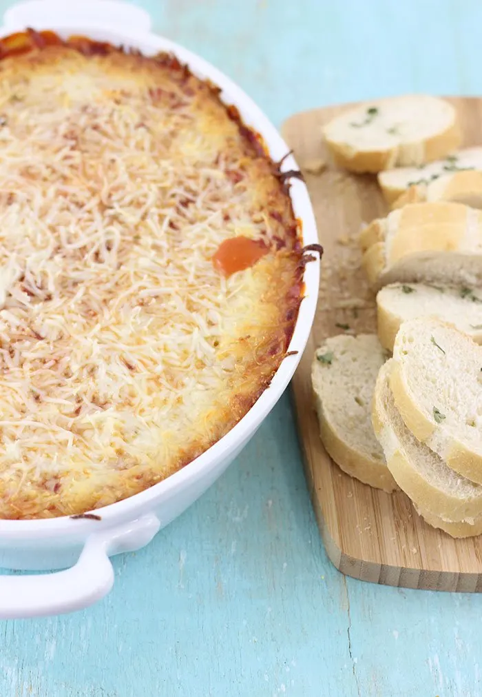 Chicken Parmesan Dip. Click the image to get this cheesy amazingness right now. 
