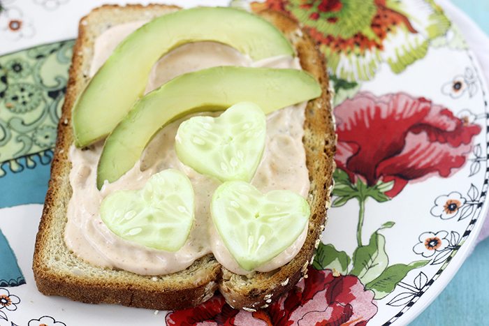 Veggie Valentine's Day Twist. Veggie Toasts with Cute Heart Shaped Veggies Served on Top.