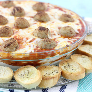 Layered Meatball Party Dip. Delicious oozy layers of cheese and meatballs. YUM.