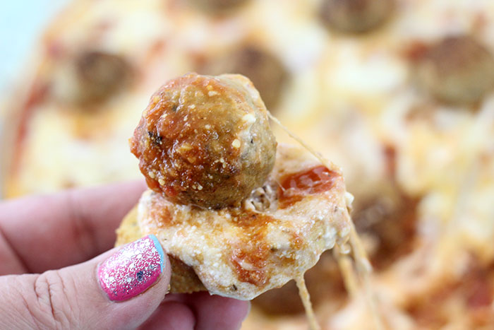 Layered Meatball Party Dip. Delicious oozy layers of cheese and meatballs. YUM.