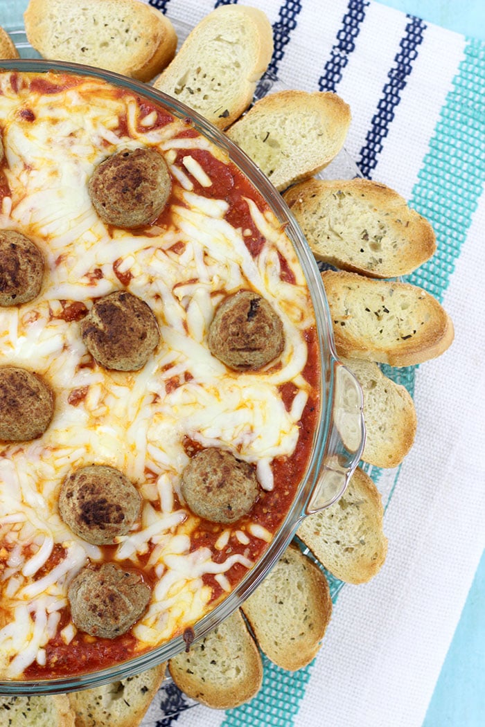Layered Meatball Party Dip. Delicious oozy layers of cheese and meatballs. YUM.