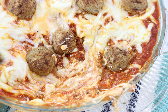 Layered Meatball Party Dip. Delicious oozy layers of cheese and meatballs. YUM.