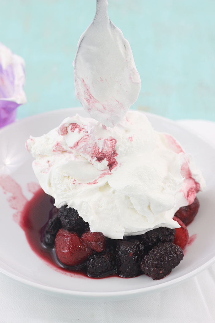 Pie Crust Nachos using baked Pie Crust cut into tortilla shaped and topped with Berry infused Whipped Topping, Strawberry sauce & Chocolate drizzle.