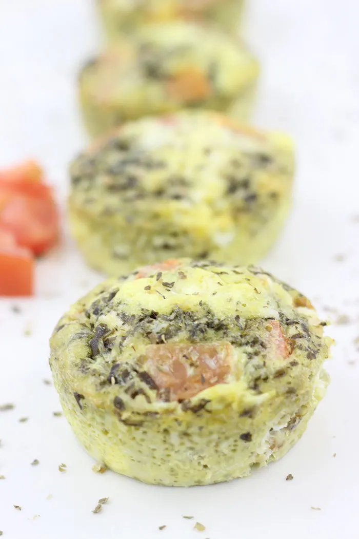 Pesto Omelet Cups. Easy to make with a muffin tin and absolutely delish for breakfast. 