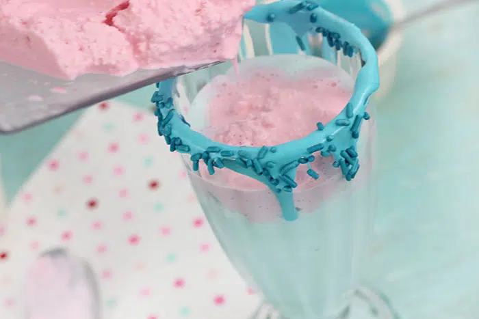 Unicorn Milkshakes are magical and oh so easy to whip up. Perfect for Unicorn themed parties and girl's night in. Unicorn ice cream is all the rage.