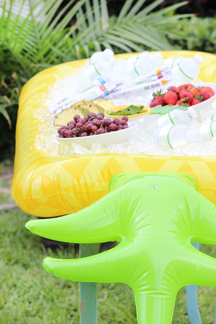 Hydration station for summer. See how to set up an easy cooler in a float and how to stock your station with hydrating food and drinks. Froozer is the perfect frozen snack to cool off with.