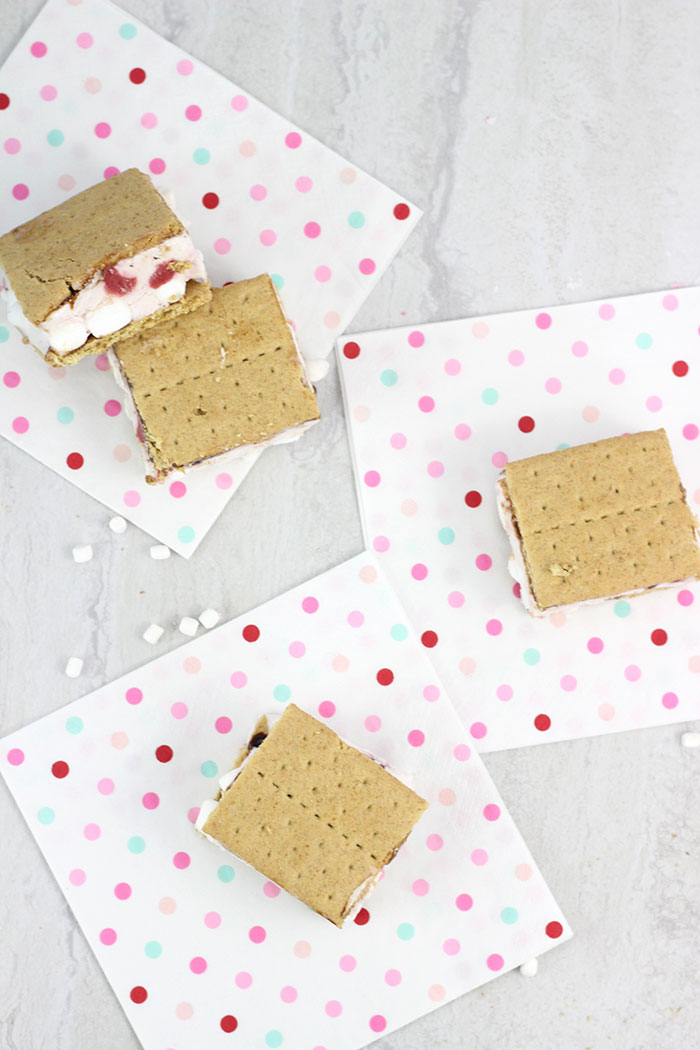 Strawberry S'mores Ice Cream Sandwiches. So easy and yummy. Customize your own ingredients.