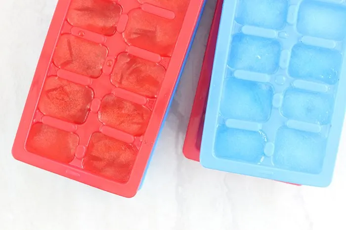 Patriotic Punch. Make colorful juice ice cubes and just add soda for the perfect and simple Labor day recipe.