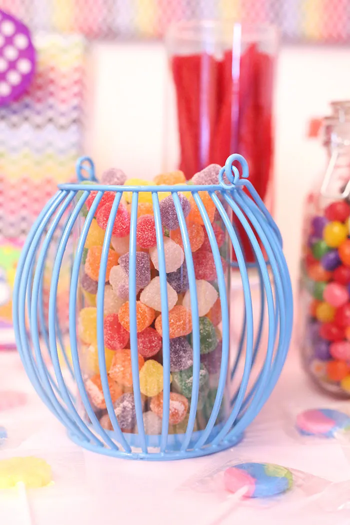 DIY Candy Buffet! Super easy and so fun. Use bright and whimsical colors to make it more magical.