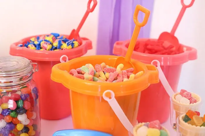 DIY Candy Buffet! Super easy and so fun. Use bright and whimsical colors to make it more magical. 