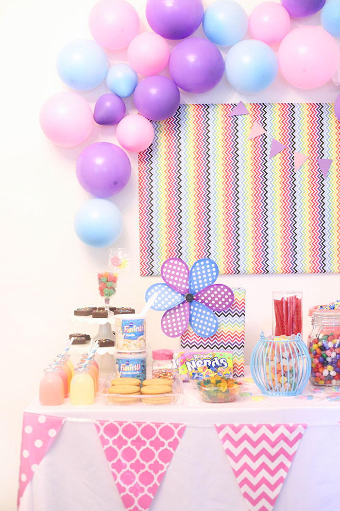 DIY Candy Buffet! Super easy and so fun. Use bright and whimsical colors to make it more magical. 